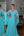 Vestido decote V bordado lateral cintura e manga flare