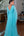 Vestido decote V bordado lateral cintura e manga flare