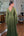 Vestido decote V bordado lateral cintura e manga flare